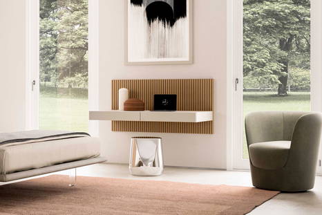 Ala desk wall unit with the Opla armchair and the Haik end table