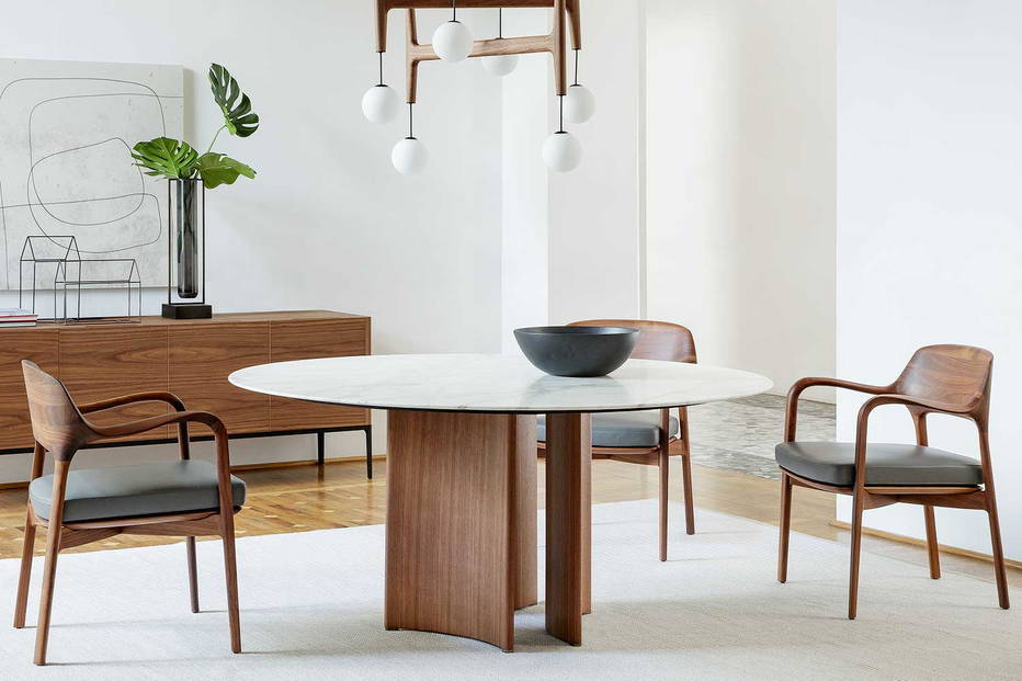 Alan round dining table with Ella dining chairs by Porada