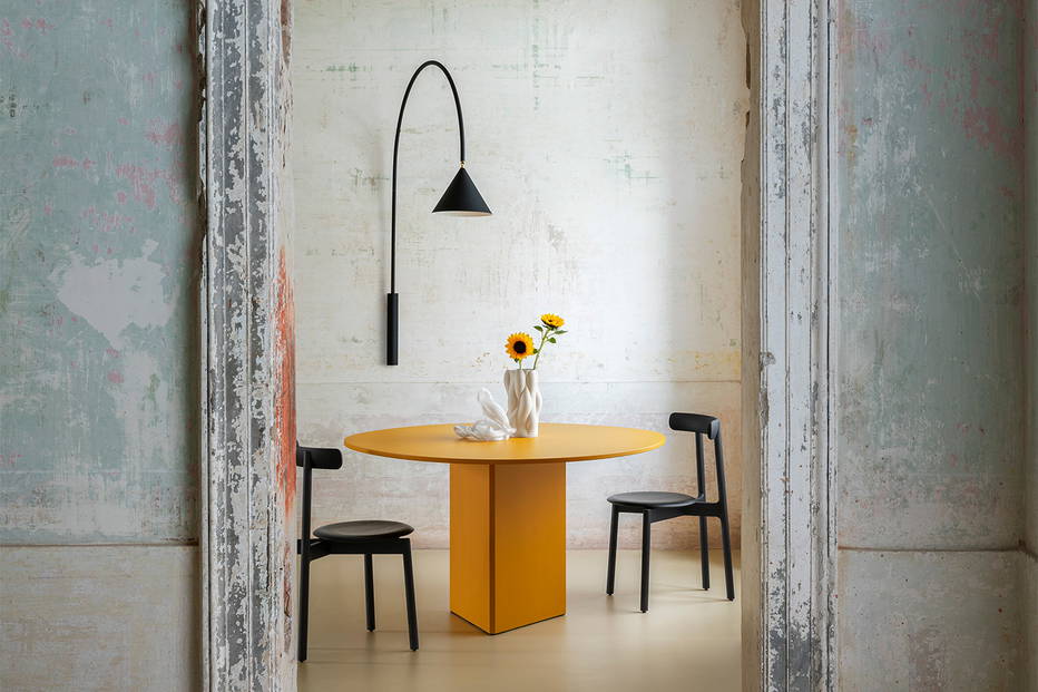 Albio Shaped Dining Table is available in a variety of lacquer, wood, and ceramic finishes