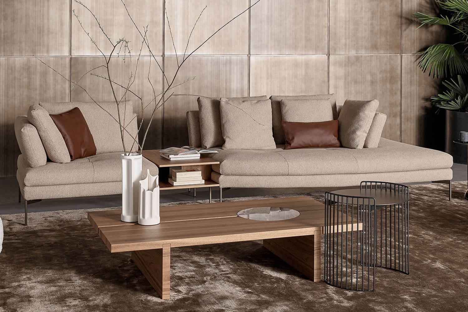 The Aliante sectional with the Moon coffee table and Harpe end table.