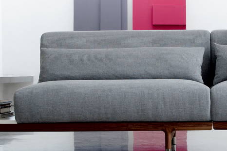 Argo lumbar pillow on Argo sofa with side table by Porada