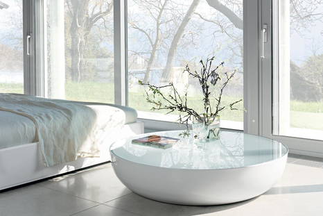 Planet coffee table by Bonaldo in a bedroom setting 