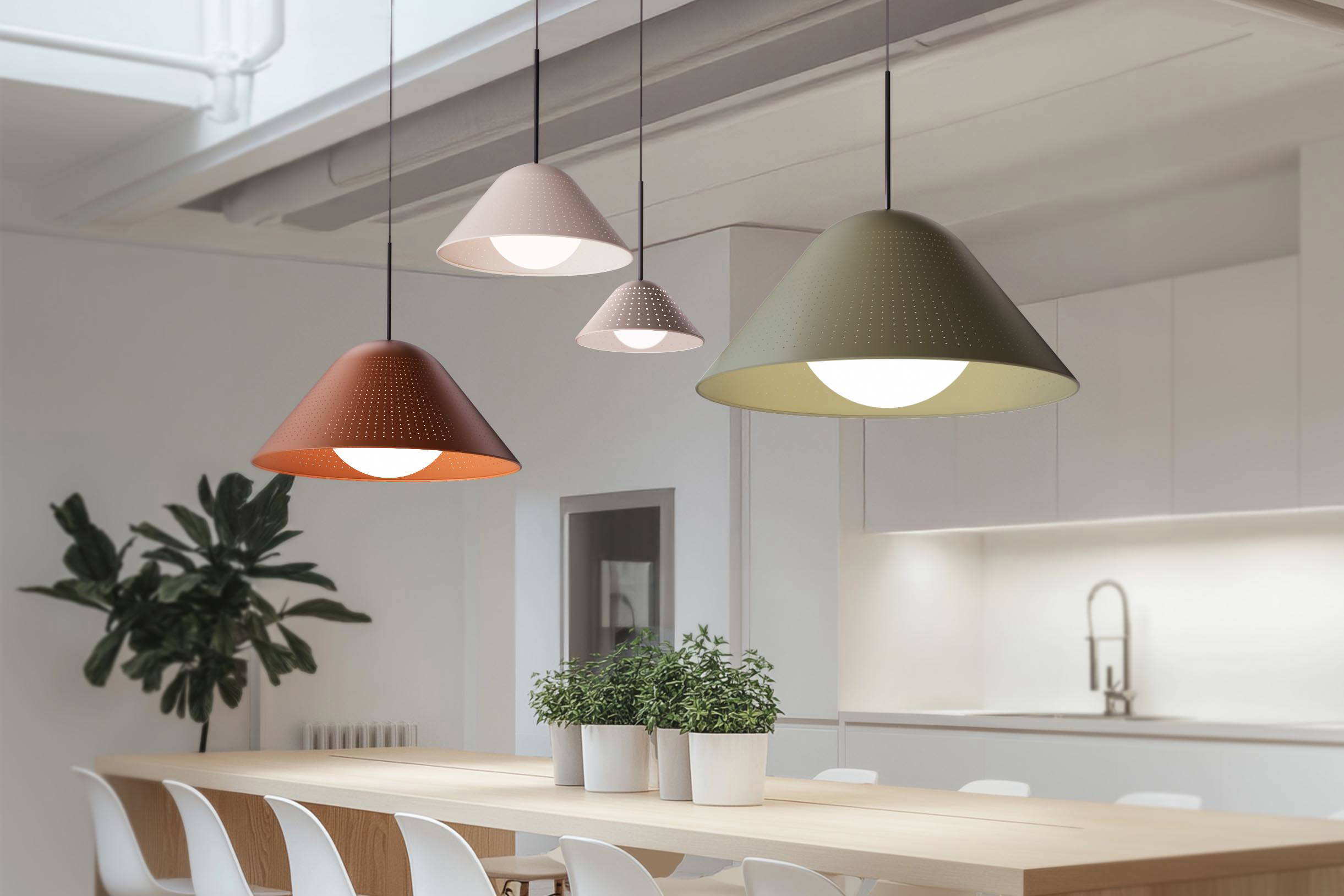 A cluster of Bola Bell pendent lights placed in a kitchen.