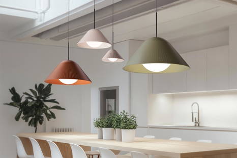 A cluster of Bola Bell pendent lights placed in a kitchen.