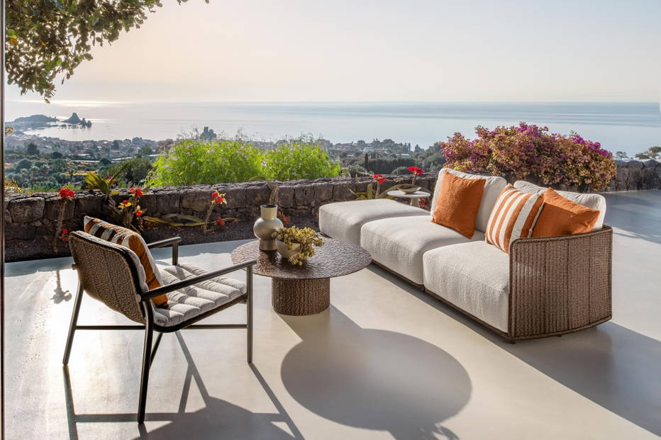 The Bond sectional sofa with peninsula with the Bond coffee table and Bond lounge armchair.
