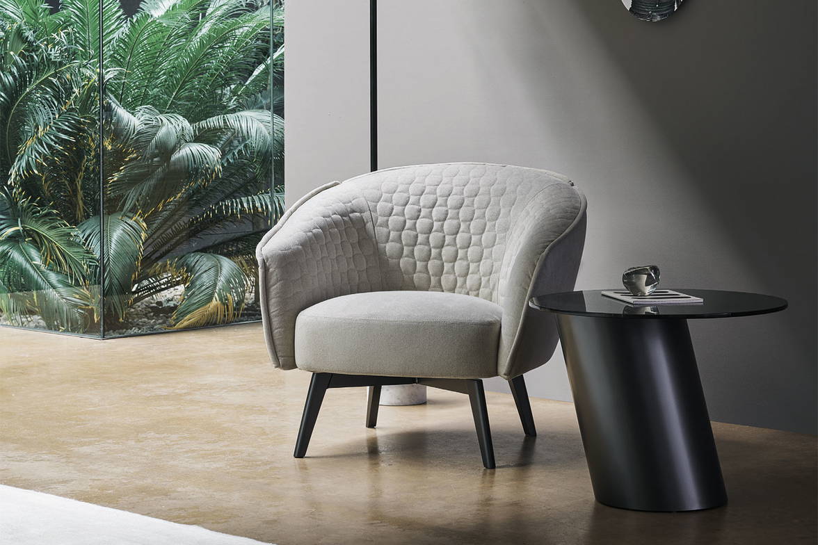 The Bruno Ego armchair with the Pisa end table. The Bruno Ego armchair with the Pisa end table.