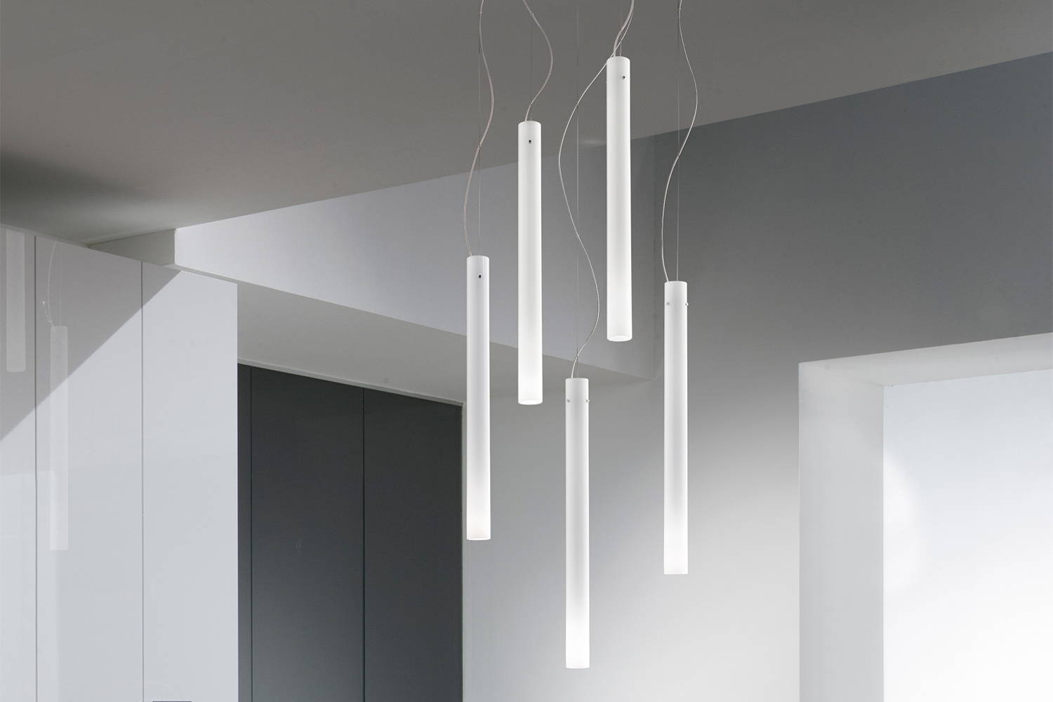 Candela Pendant Lights hanging in a walk-in closet