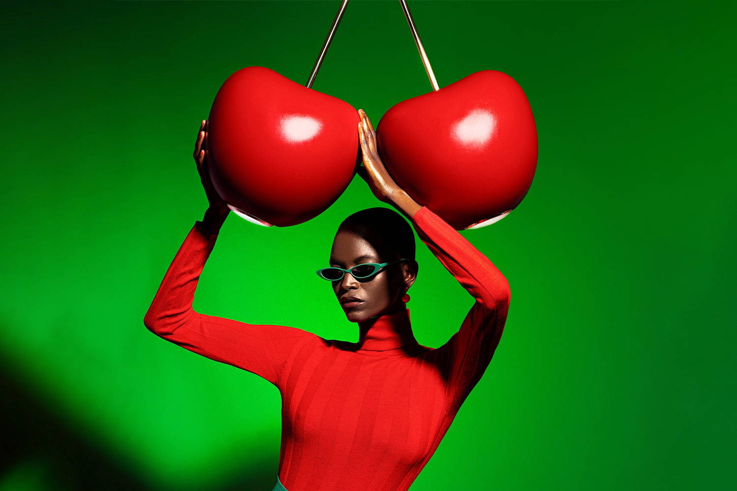 Woman holding the Cherry Pendant Light
