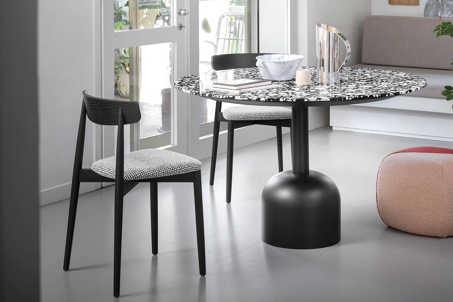 Claretta Dining Chair designed by Florian Schmid (also pictured: Illo Bistro Table  and Furoshiki Pouf)
