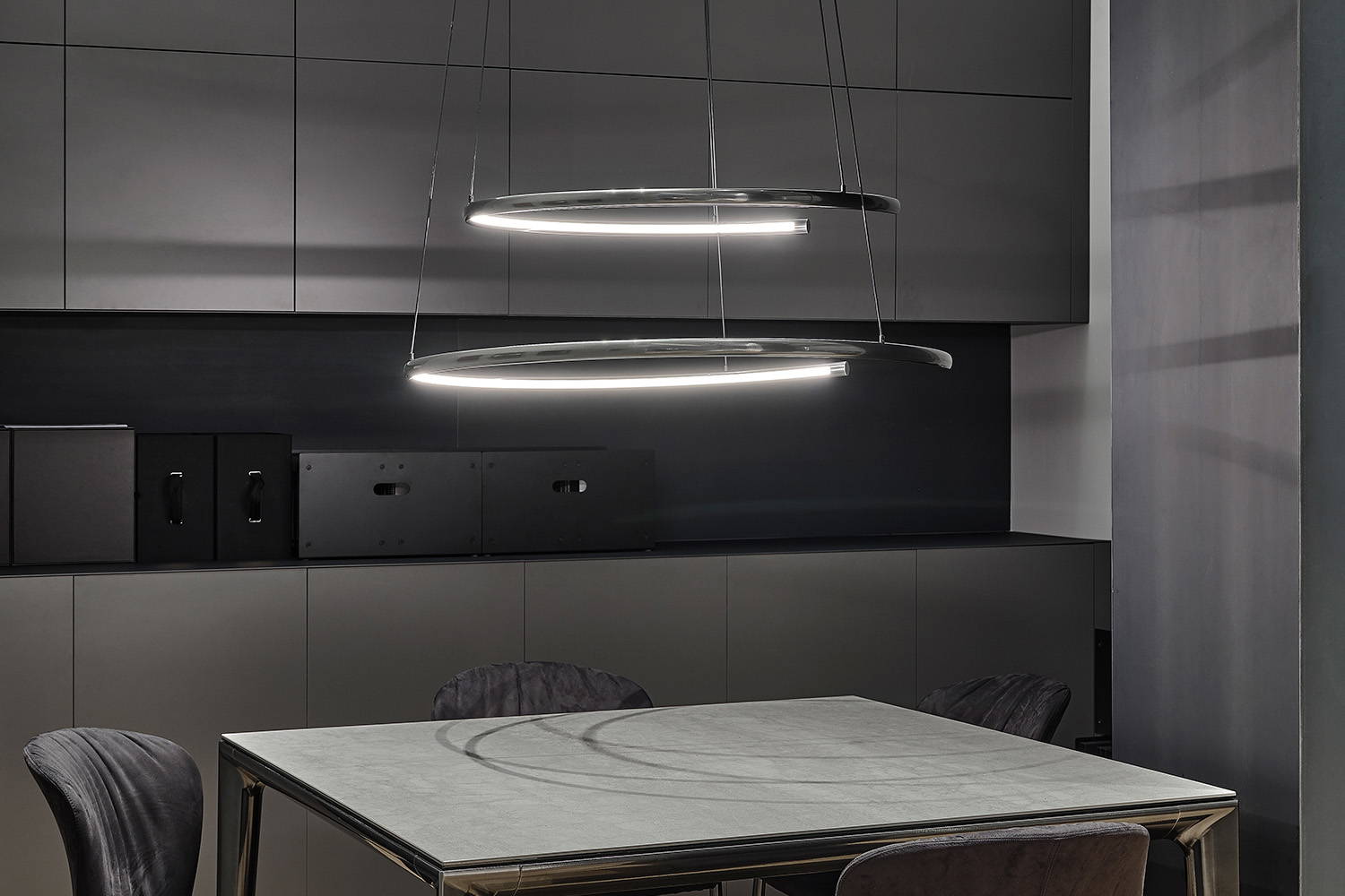 Comet suspension light over Duke dining table