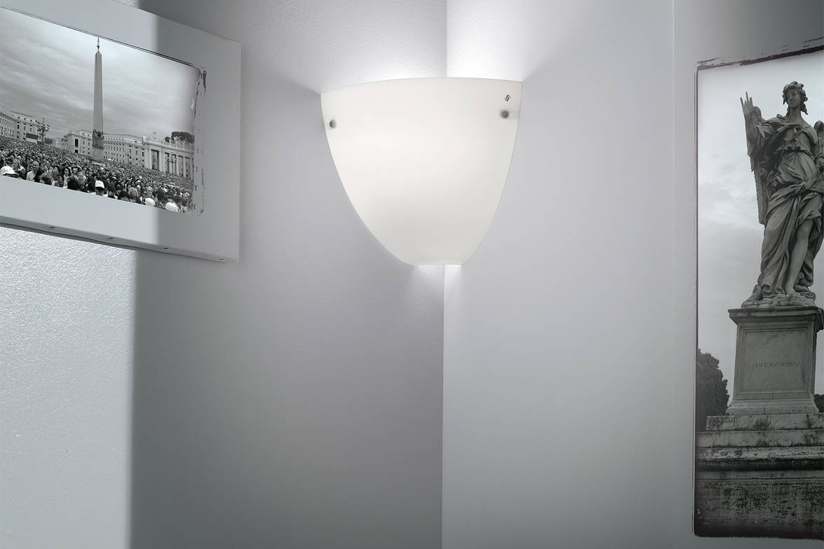 Corner wall sconce in home office Corner wall sconce in home office
