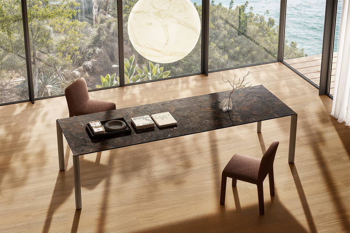 The Correr Slim dining table with a top in Umbra MDi. The Correr Slim dining table with a top in Umbra MDi.