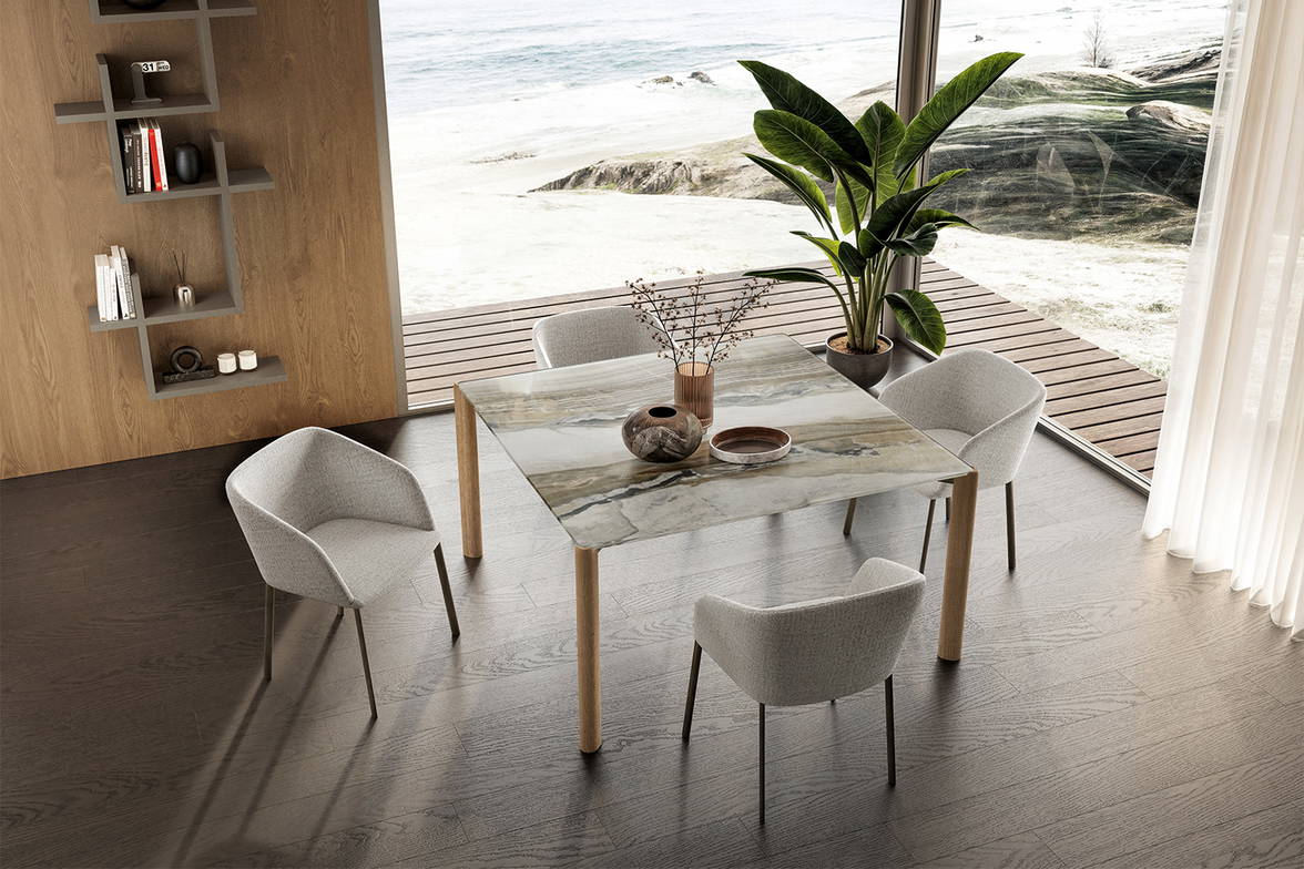 The Correr Slim square dining table with Amida dining chairs. The Correr Slim square dining table with Amida dining chairs.