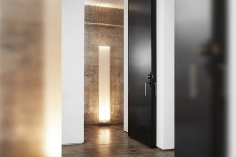 Cortina floor lamp by Pablo Designs in a corridor 