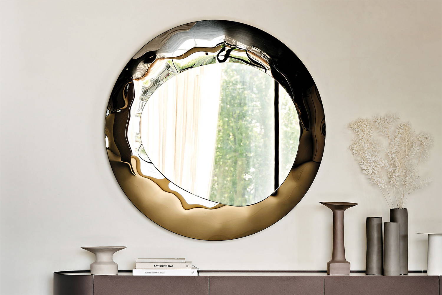 Cosmos mirror in bronze.
