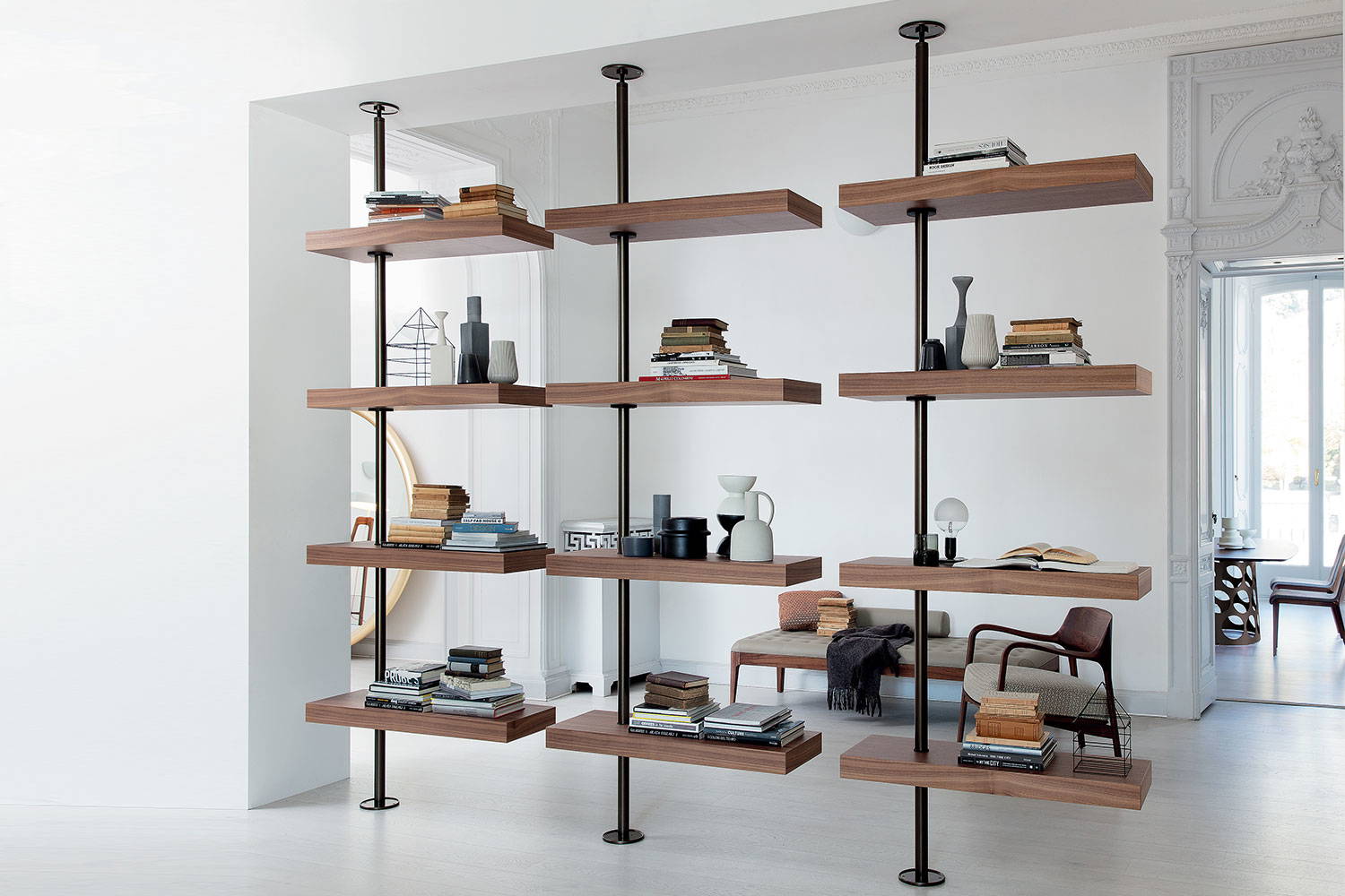 Domino expo bookcase in living room setting by Porada