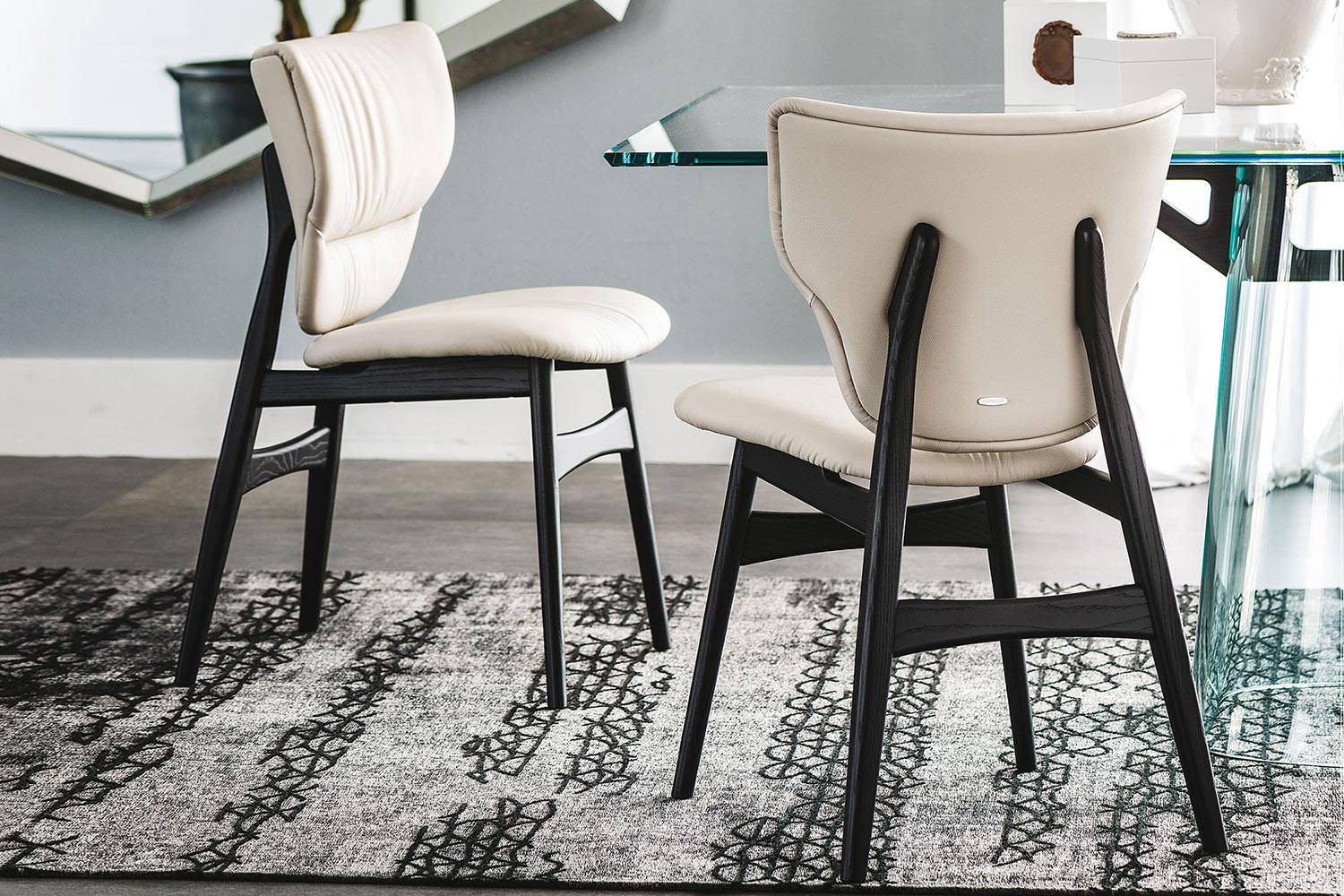 Dumbo dining chairs by Cattelan Italia in different positions 