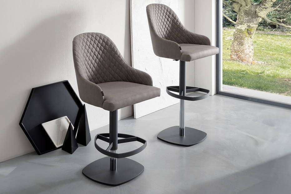 Dylan adjustable bar stools at two different heights