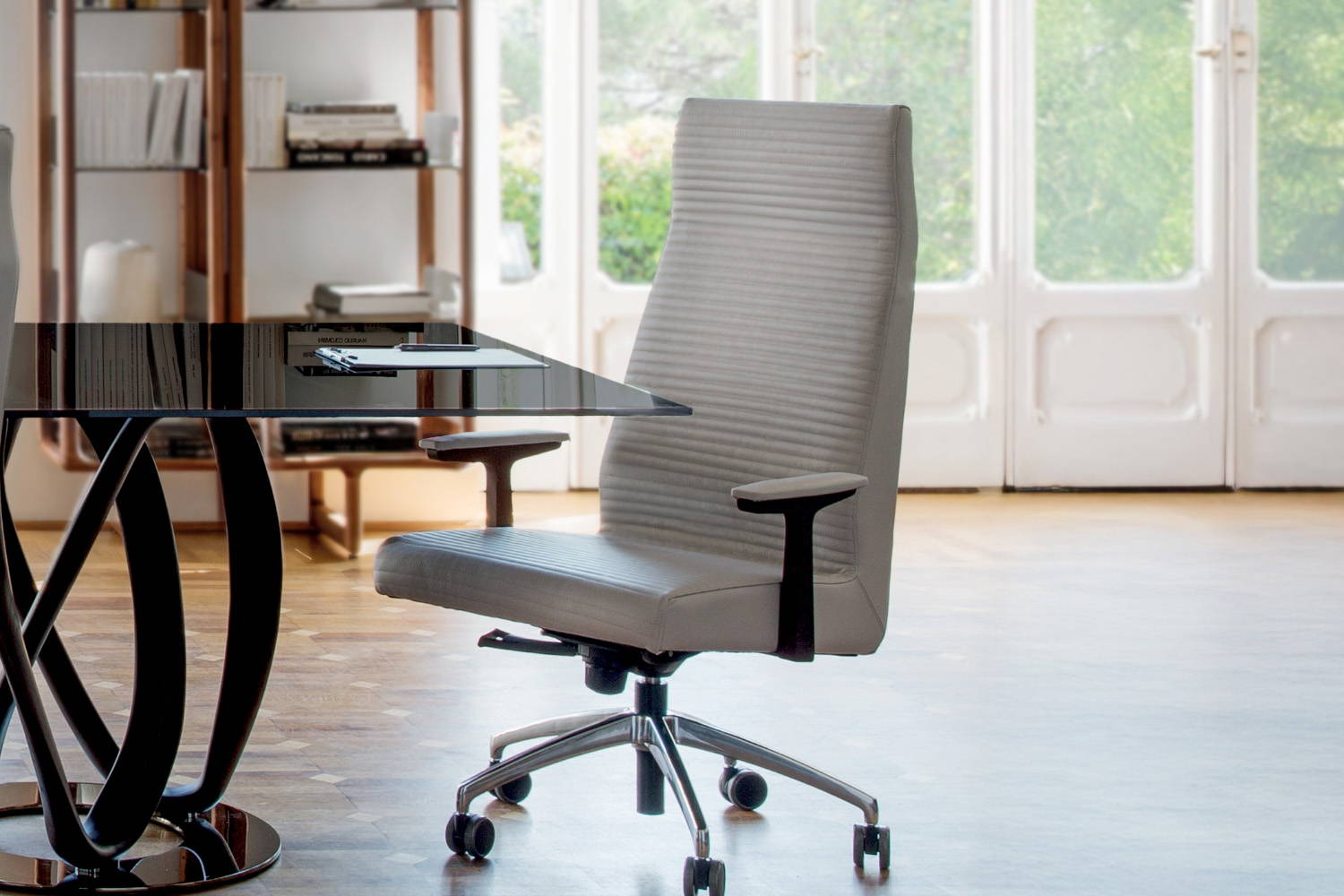 Elis armchair by Porada