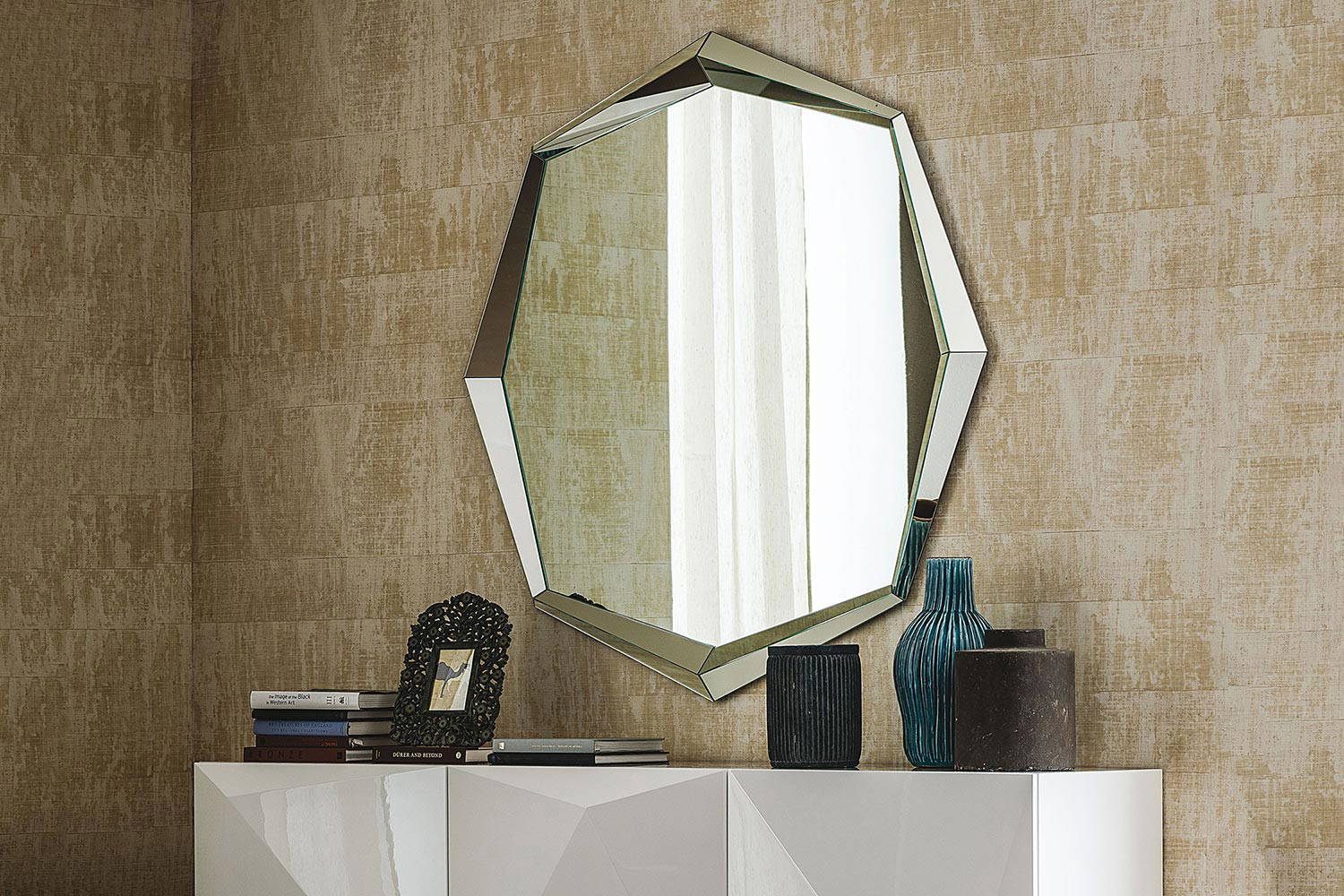 Emerald Octagonal mirror by Cattelan Italia hung over Kayak buffet