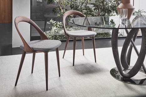Ester dining chairs close-up with the Infinity table