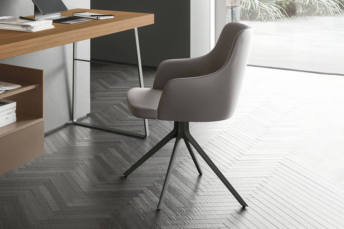Eva swivel dining armchair, side view Eva swivel dining armchair, side view