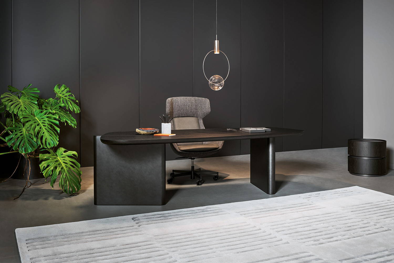 The Flatiron desk with a Newton chair and Keshi light.