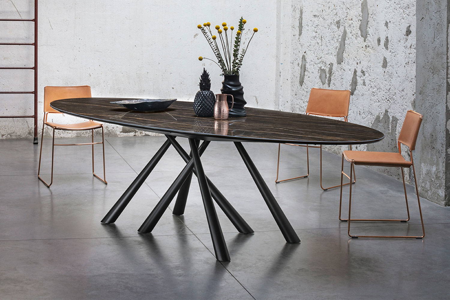 Forest ceramic dining table with Slim hard leather dining chairs by Midj