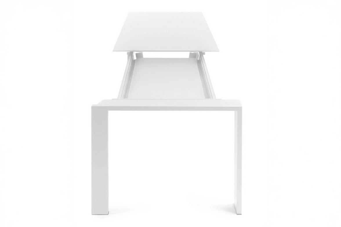 Four Extendable Dining Table designed by Ferruccio Laviani Four Extendable Dining Table designed by Ferruccio Laviani