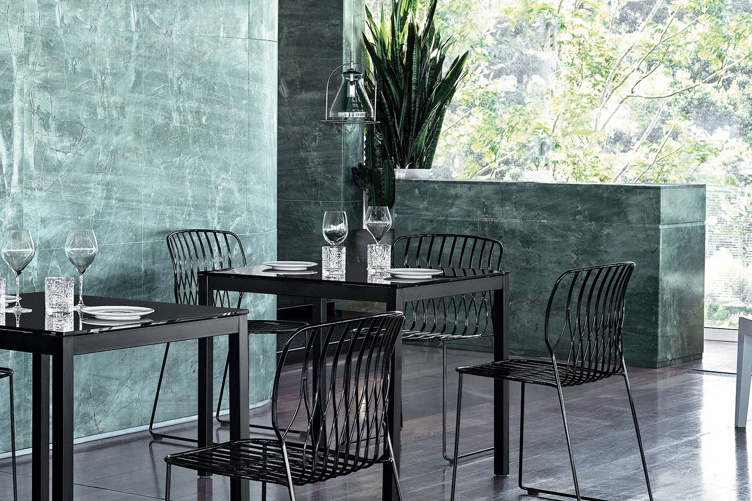 Funky pendant light with Diesis table and Freak chairs