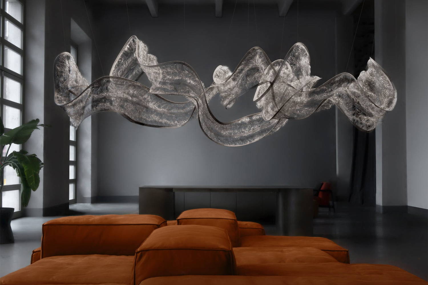 Genesis Suspension Sculpture above sectional sofa