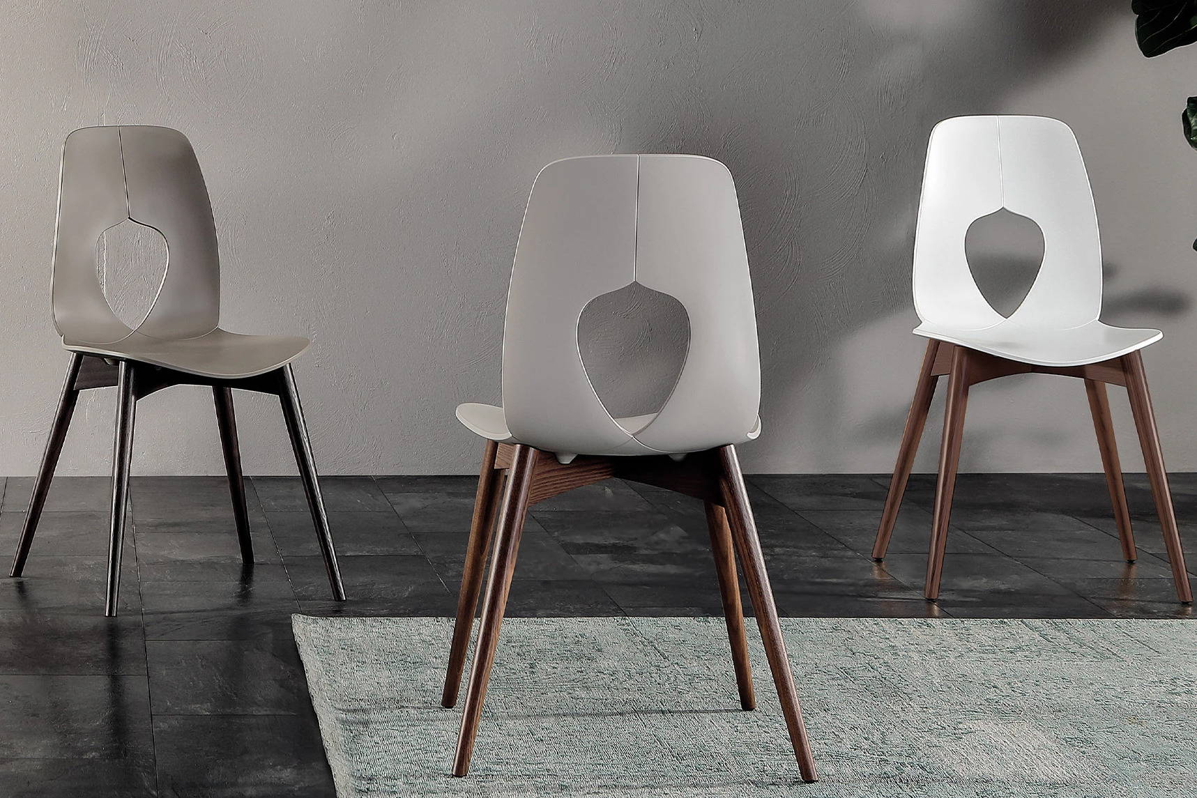 Hole Wood Dining Chair in various positions