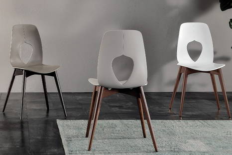 Hole Wood Dining Chair in various positions