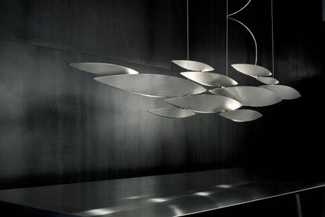 I Lucci Argentati suspension light by Terzani above a dining table