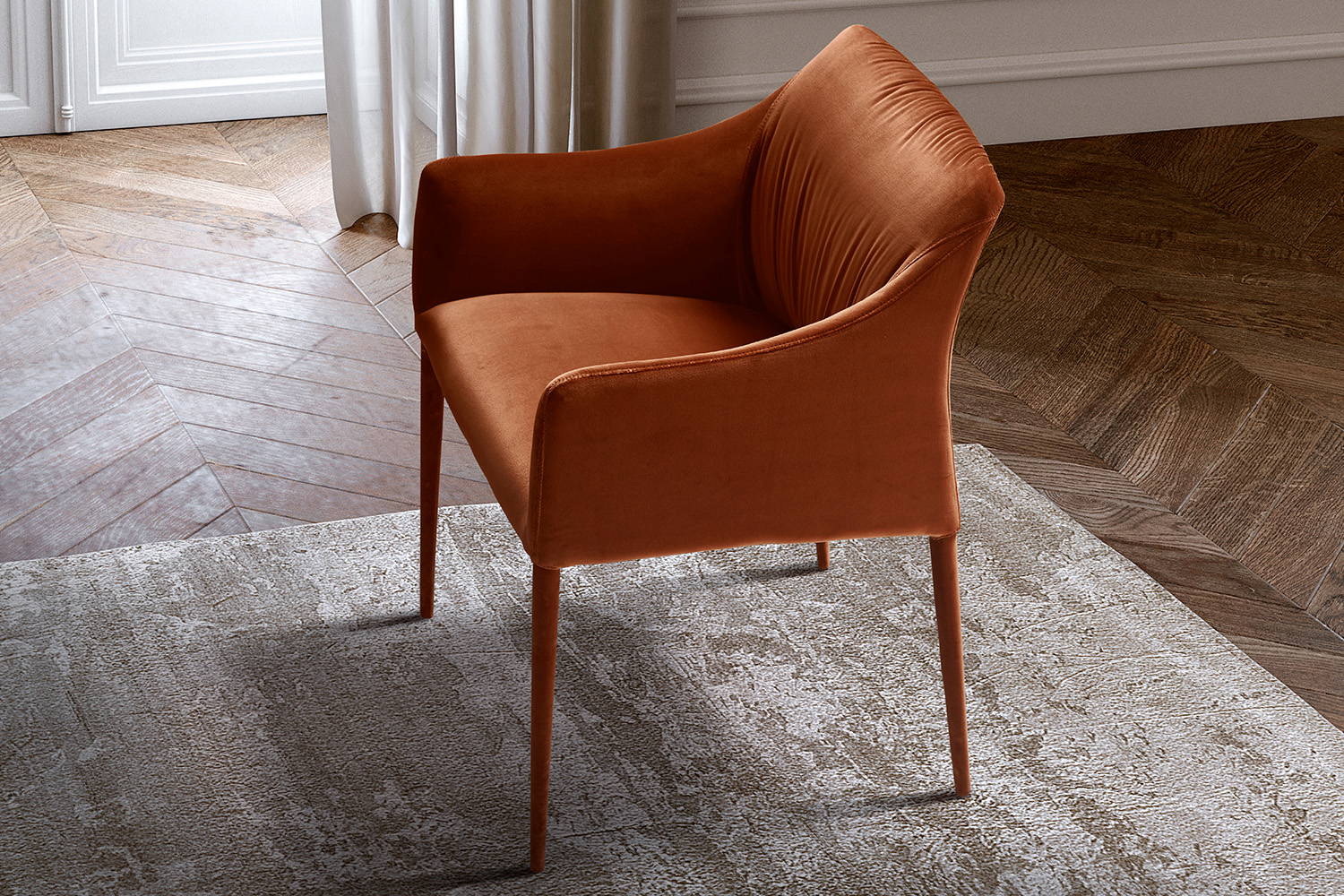 Isidora upholstered dining chair designed by Antoy Filips for eforma