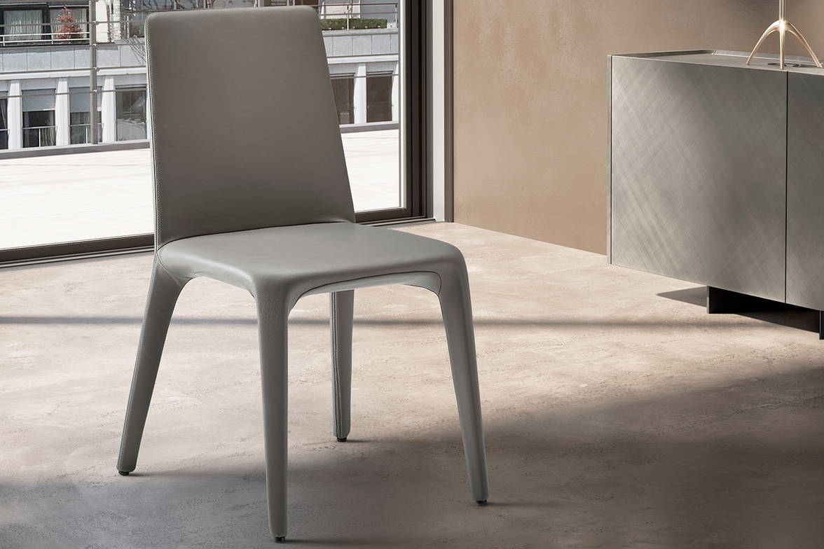 Karma upholstered dining chair designed by Davide Varotto for eforma Karma upholstered dining chair designed by Davide Varotto for eforma