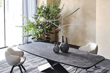 Katana linear suspension composition by Cattelan Italia in a dining room setting 