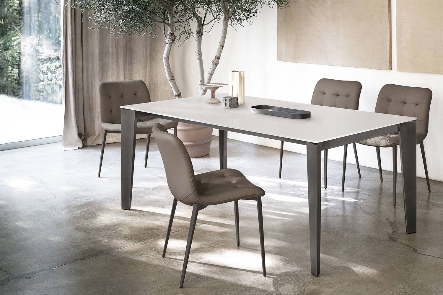Kuga Dining chairs with the Cruz extension dining table.