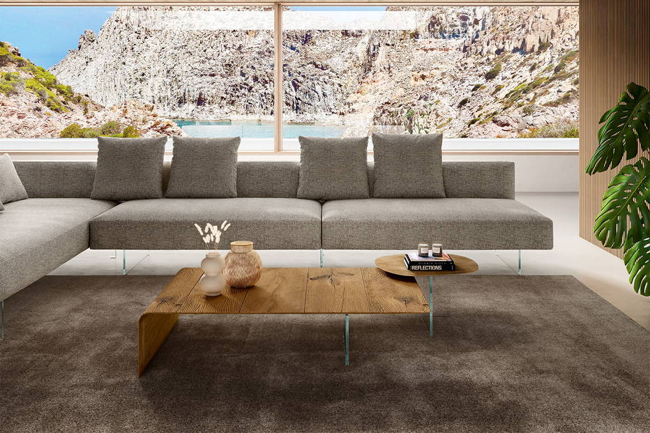 The Lean coffee table with the Pleasure end table and Air sectional sofa