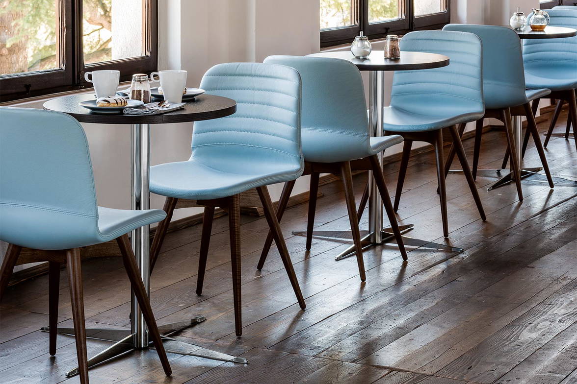 Liu upholstered dining chairs in a restaurant setting (R: wood legs) Liu upholstered dining chairs in a restaurant setting (R: wood legs)