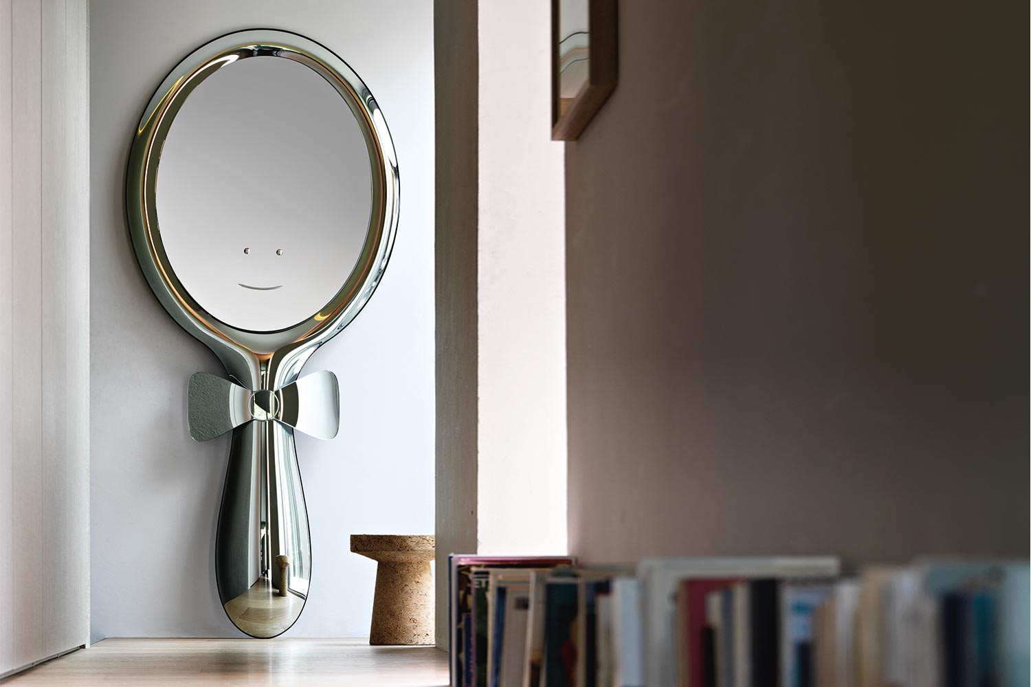 The Lollipop mirror is made in Italy.