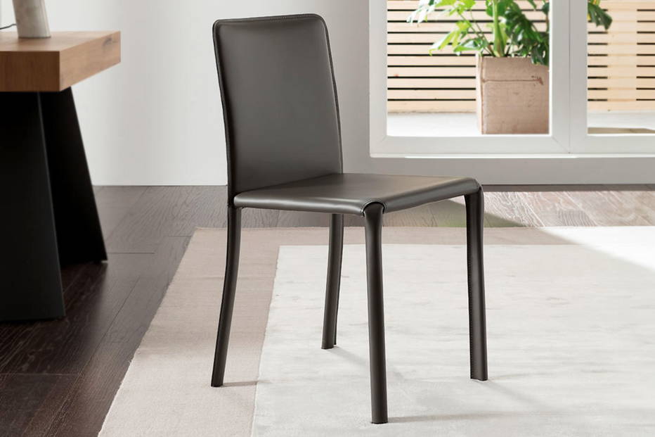 Lunette hard leather dining chair by Ozzio Italia