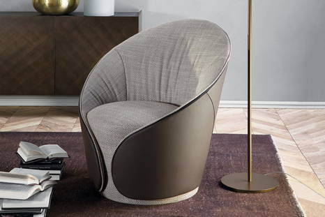 Mama low armchair by Tonin Casa comes with dual-toned upholstery on request
