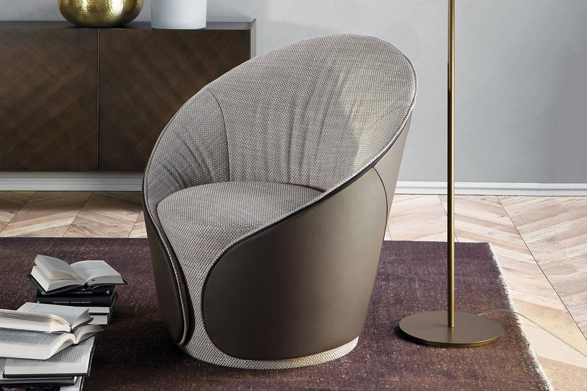 Mama low armchair by Tonin Casa comes with dual-toned upholstery on request Mama low armchair by Tonin Casa comes with dual-toned upholstery on request