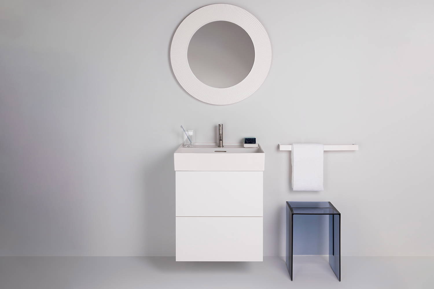 Max-Beam end table with the All Saints mirror bathroom setting
