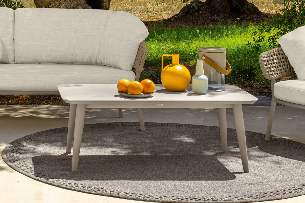 Moon Alu coffee table by Talenti in an outdoor setting Moon Alu coffee table by Talenti in an outdoor setting