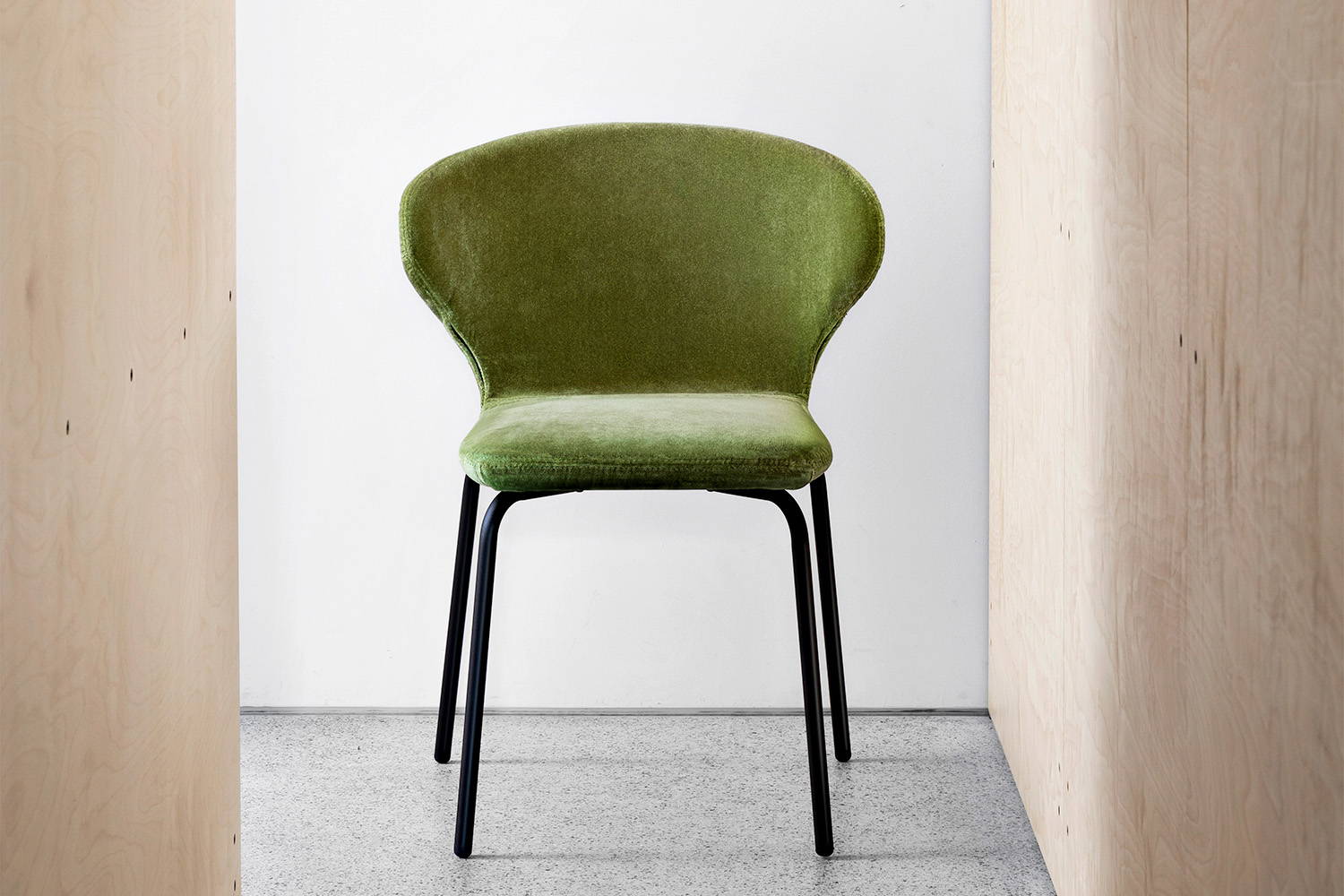 Mula Dining Chair is available in a variety of upholstered fabrics