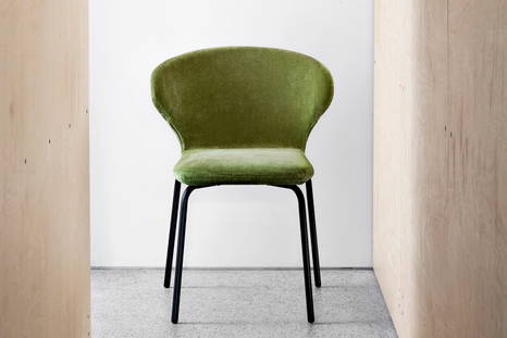 Mula Dining Chair is available in a variety of upholstered fabrics
