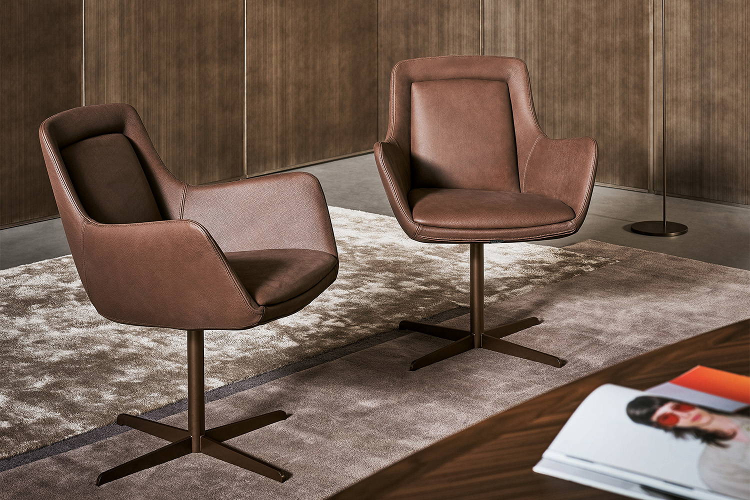 Two Newton swivel dining chairs by Bonaldo.