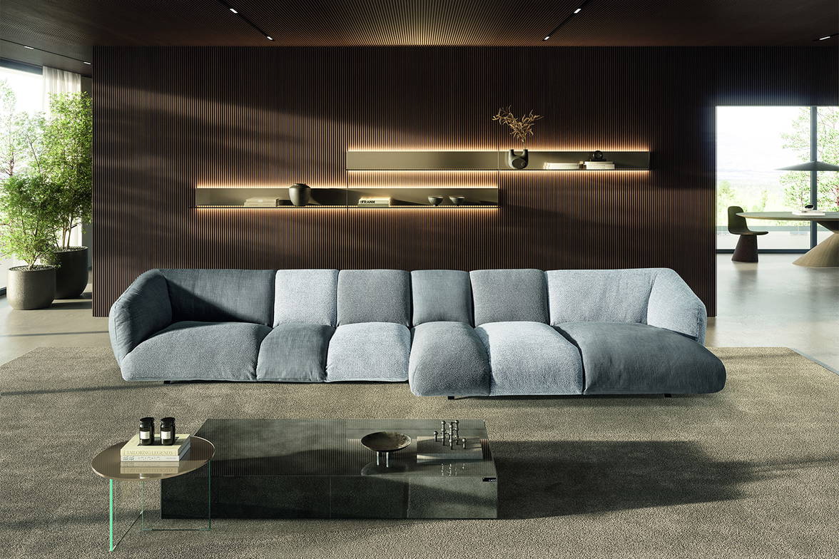 The N.O.W. Sectional Sofa With Chaise with an Air XGlass end table and a Materia coffee table. The N.O.W. Sectional Sofa With Chaise with an Air XGlass end table and a Materia coffee table.